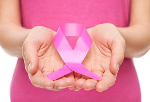 A resized image of a woman holding a twisted pink ribbon.