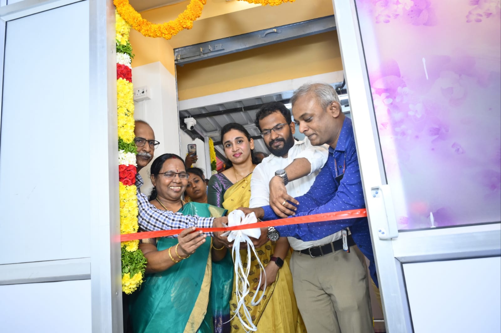The ribbon cutting at the opening of the new Anderson Diagnostic Center at Periyar Nagar.